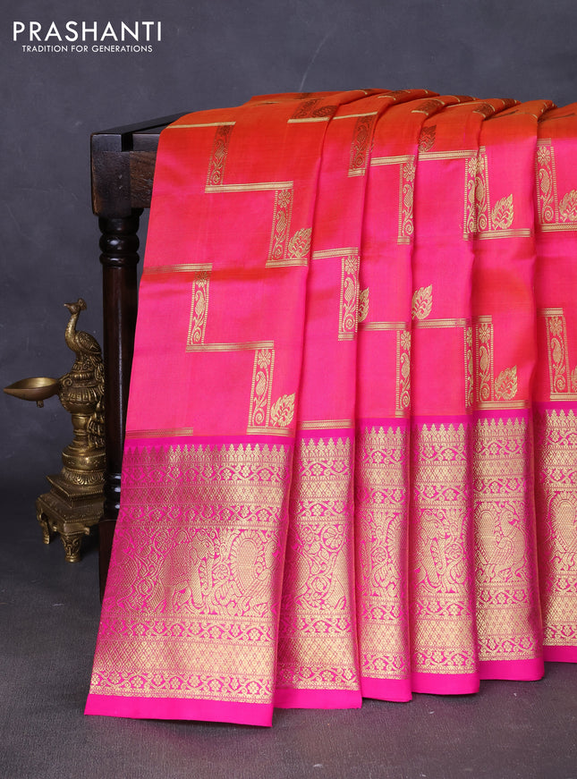 Venkatagiri silk saree dual shade of pinkish orange and pink with allover zig zag zari weaves and long zari woven border