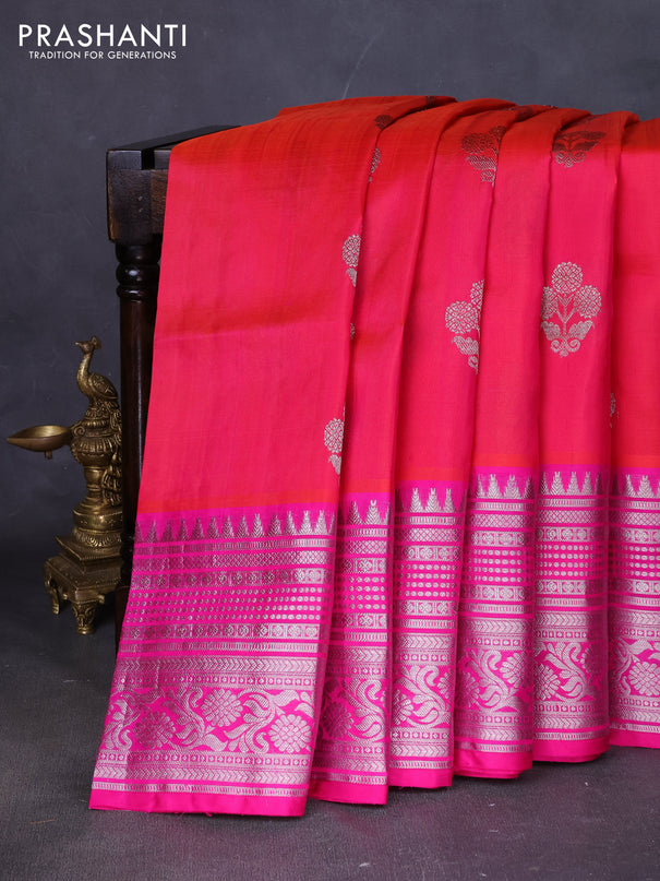 Venkatagiri silk saree dual shade of pinkish orange and pink with allover silver zari woven buttas and long silver zari woven border