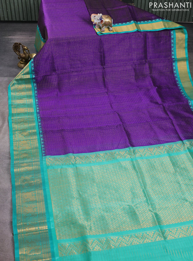 Kuppadam silk cotton saree violet and teal green with allover laksha deepam pattern and zari woven border
