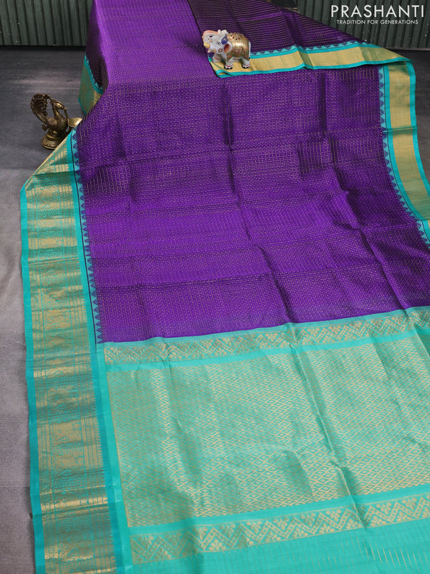 Kuppadam silk cotton saree violet and teal green with allover laksha deepam pattern and zari woven border