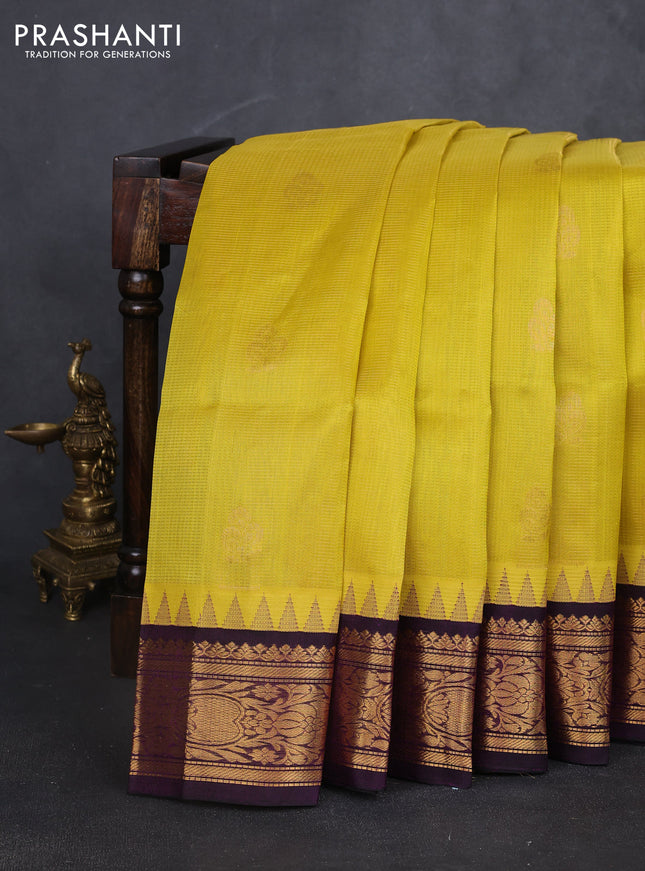 Kuppadam silk cotton saree lime yellow and deep purple with allover vairosi pattern & buttas and temple design zari woven border