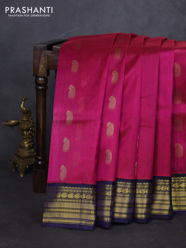 Kuppadam silk cotton saree pink and navy blue with allover paisely zari woven buttas and temple design zari woven border
