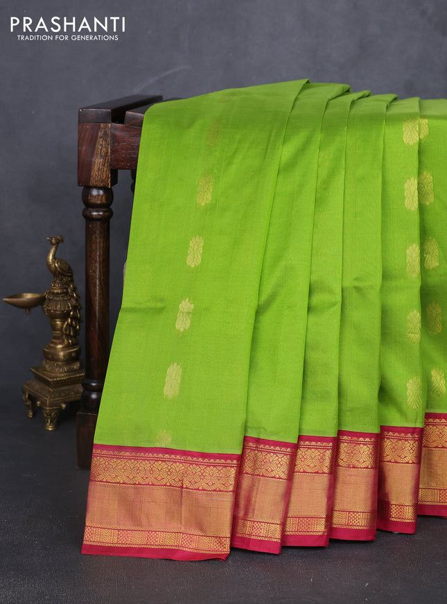 Kuppadam silk cotton saree light green and maroon with plain body and rettapet zari woven border