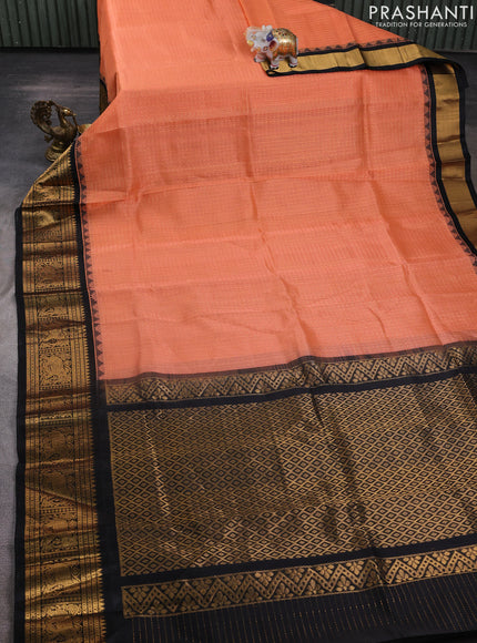 Kuppadam silk cotton saree peach orange and black with allover laksha deepam pattern and temple design elephant zari woven border