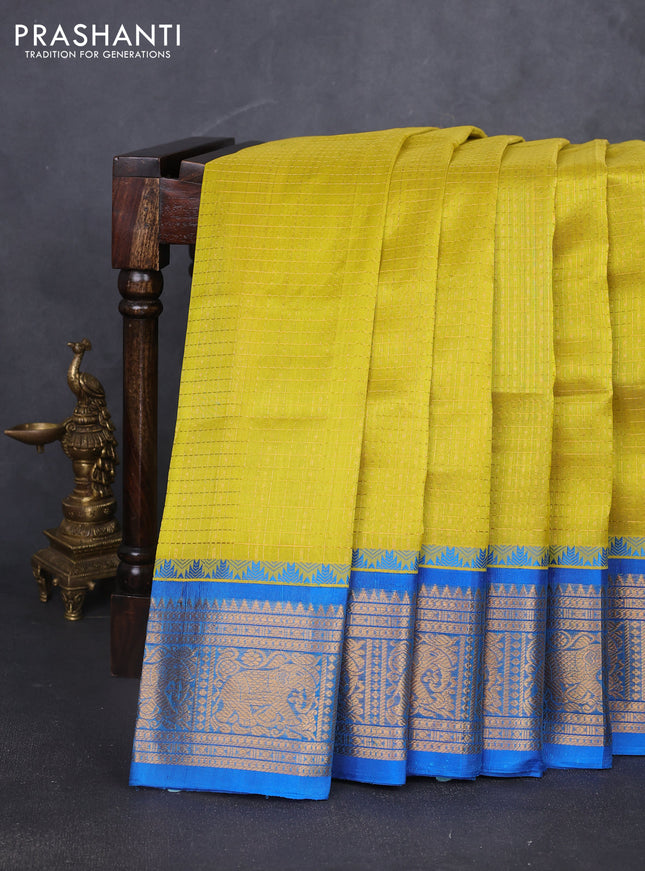 Kuppadam silk cotton saree lime yellow and cs blue with allover laksha deepam pattern and temple design elephant zari woven border
