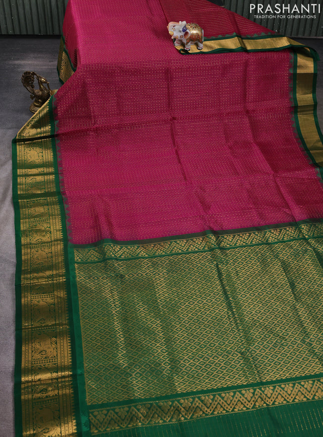 Kuppadam silk cotton saree wine shade and green with allover laksha deepam pattern and temple design elephant zari woven border