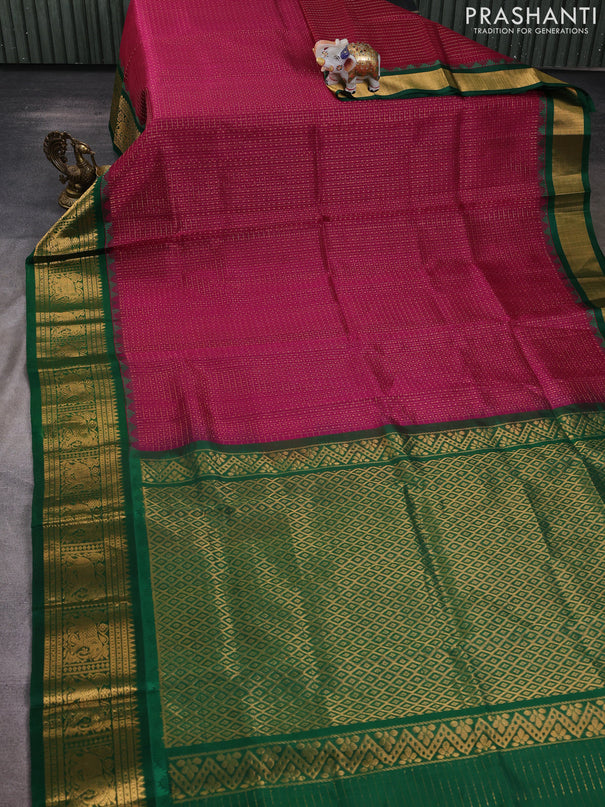 Kuppadam silk cotton saree wine shade and green with allover laksha deepam pattern and temple design elephant zari woven border
