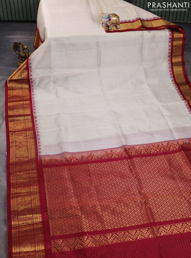 Kuppadam silk cotton saree off white and maroon with allover laksha deepam pattern and temple design elephant zari woven border