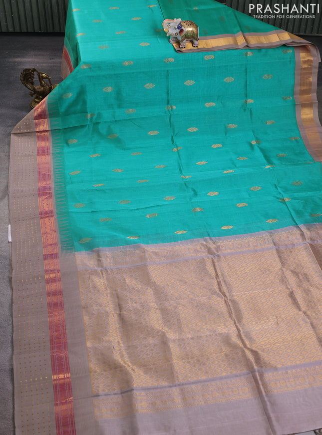 Kuppadam silk cotton saree teal green and beige with zari woven buttas and zari woven border