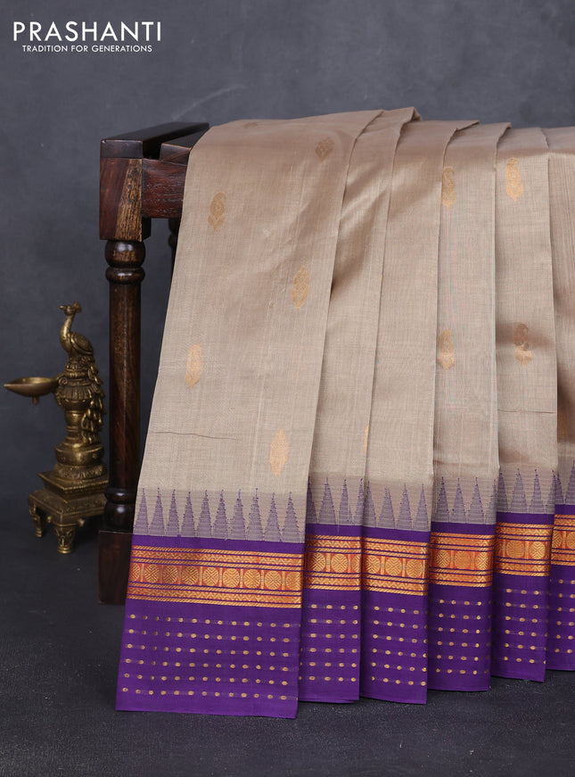 Kuppadam silk cotton saree beige and violet with allover zari woven buttas and zari woven border