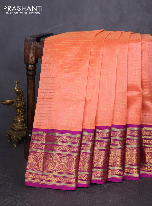 Kuppadam silk cotton saree peach orange and purple with allover small zari checked pattern and long zari woven border