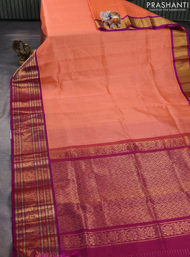 Kuppadam silk cotton saree peach orange and purple with allover small zari checked pattern and long zari woven border