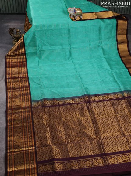 Kuppadam silk cotton saree teal green and coffee brown with allover small zari checked pattern and long zari woven border