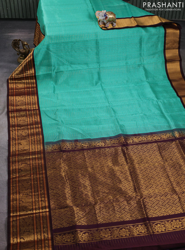 Kuppadam silk cotton saree teal green and coffee brown with allover small zari checked pattern and long zari woven border
