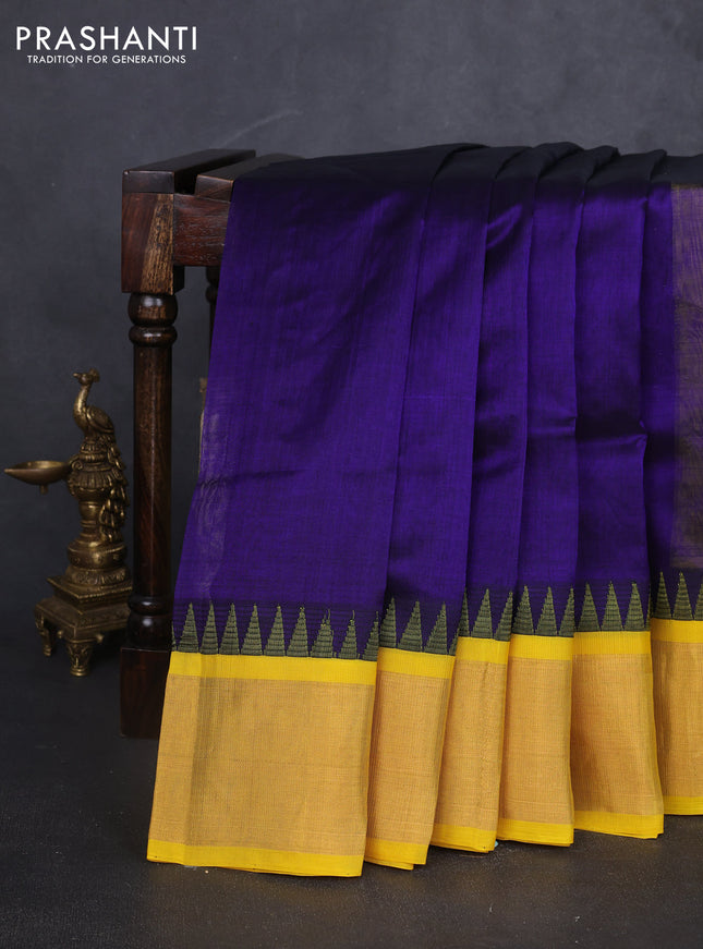Kuppadam silk cotton saree navy blue and yellow with plain body and temple design zari woven border