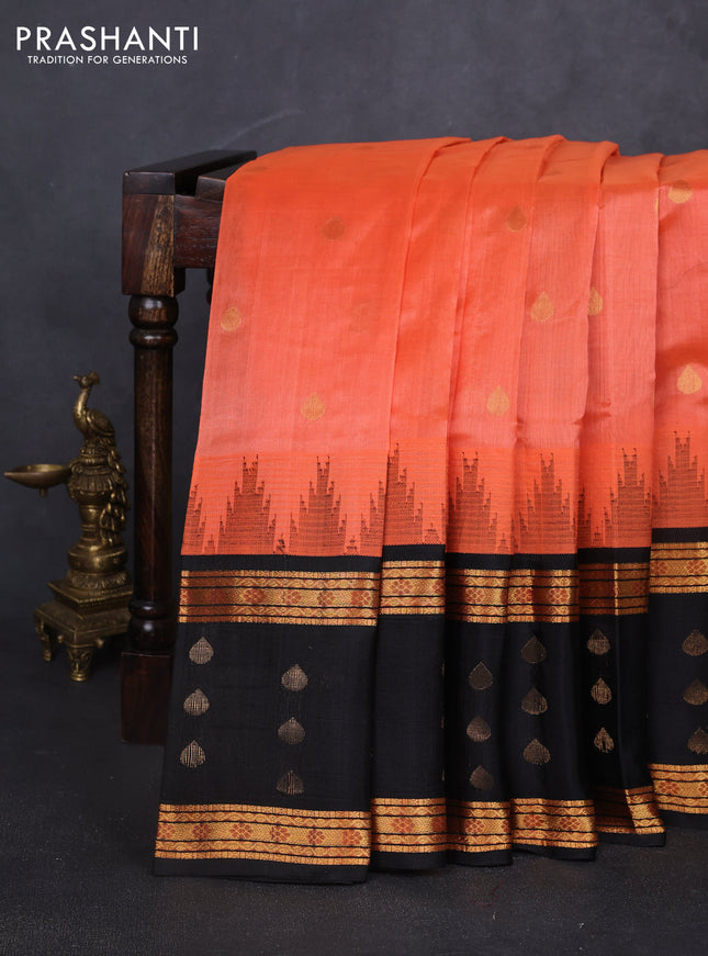 Kuppadam silk cotton saree peach orange and black with allover zari woven buttas and rettapet zari woven butta border