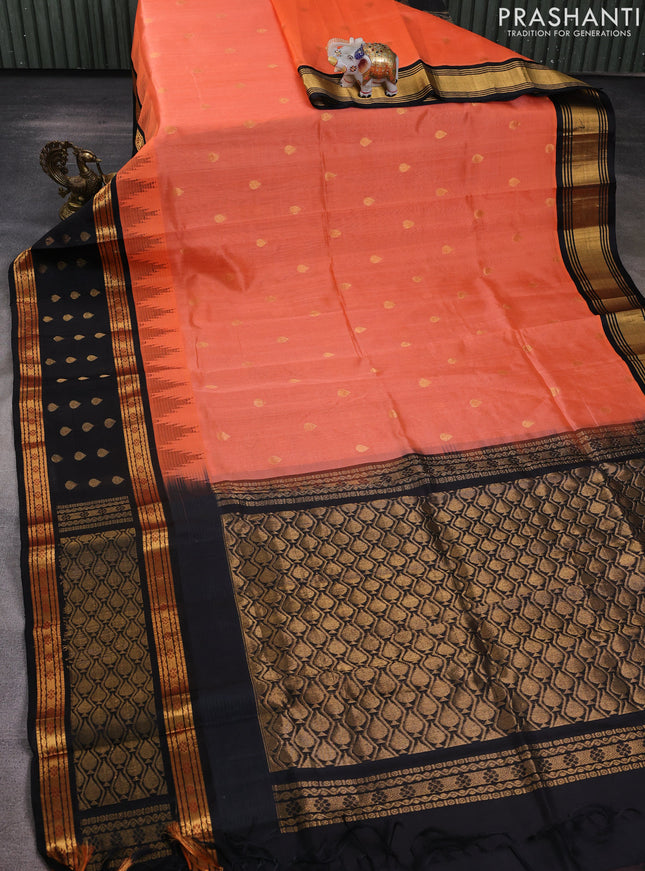 Kuppadam silk cotton saree peach orange and black with allover zari woven buttas and rettapet zari woven butta border