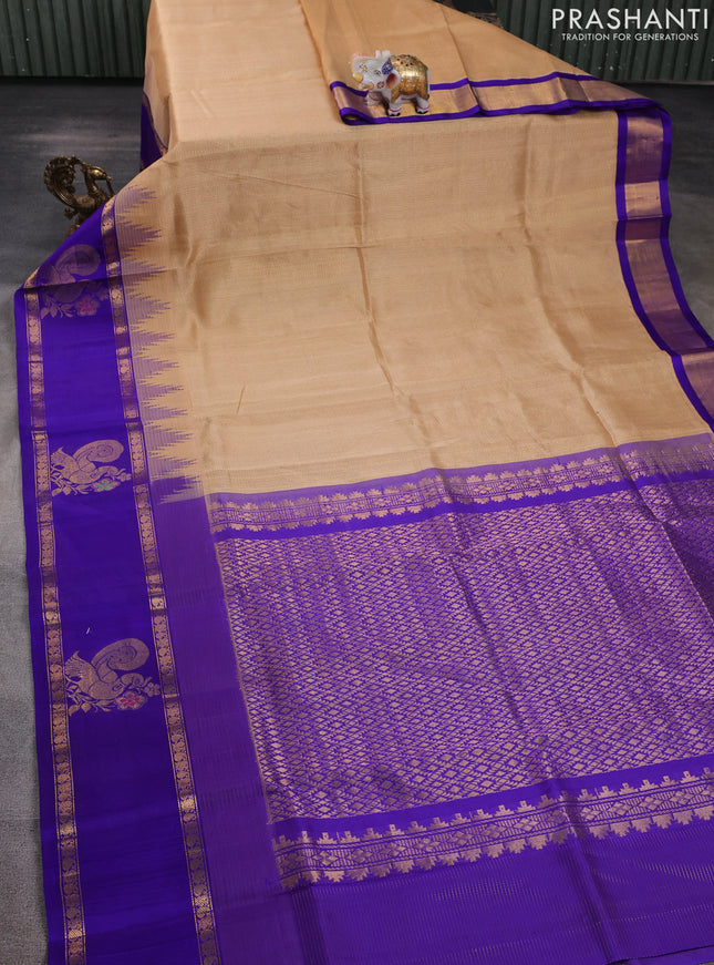 Kuppadam silk cotton saree sandal and violet with allover small zari checked pattern and rettapet zari woven butta border