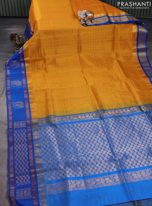 Kuppadam silk cotton saree mustard yellow and cs blue with allover zari checked pattern and rettapet zari woven butta border