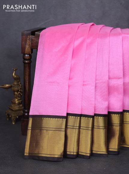 Kuppadam silk cotton saree light pink and deep coffee brown with plain body and long zari woven border