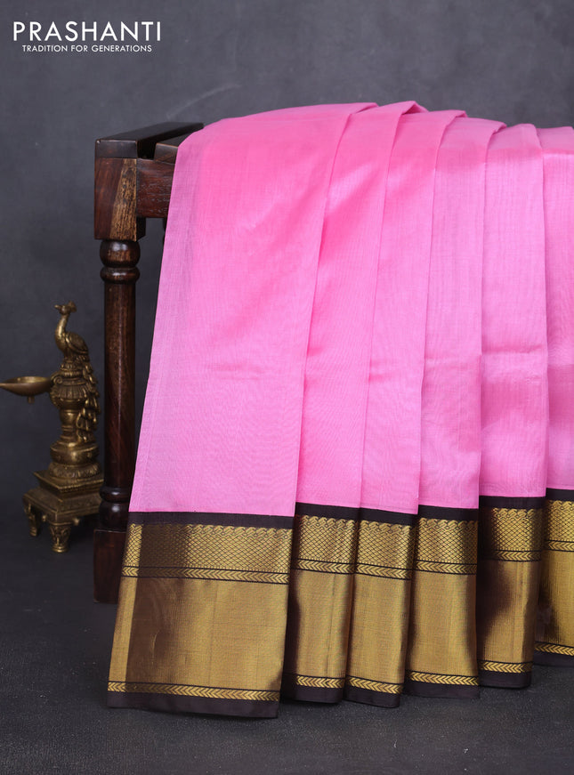 Kuppadam silk cotton saree light pink and deep coffee brown with plain body and long zari woven border