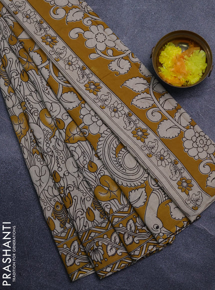 Kalamkari cotton saree beige and yellow with allover prints and printed border