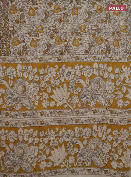 Kalamkari cotton saree beige and yellow with allover prints and printed border