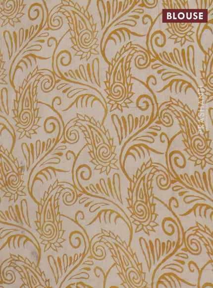 Kalamkari cotton saree beige and yellow with allover prints and printed border