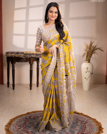 Kalamkari cotton saree yellow and beige with allover butta prints and printed border
