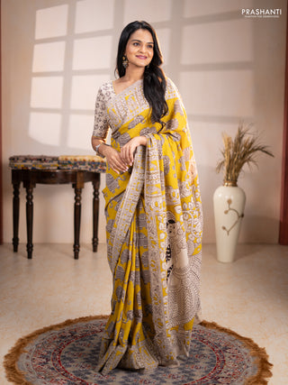 Kalamkari cotton saree yellow and beige with allover butta prints and printed border