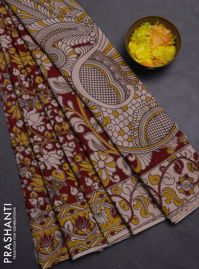 Kalamkari cotton saree maroon and yellow with allover prints and printed border