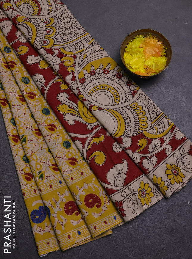 Kalamkari cotton saree beige and yellow with allover prints and printed border