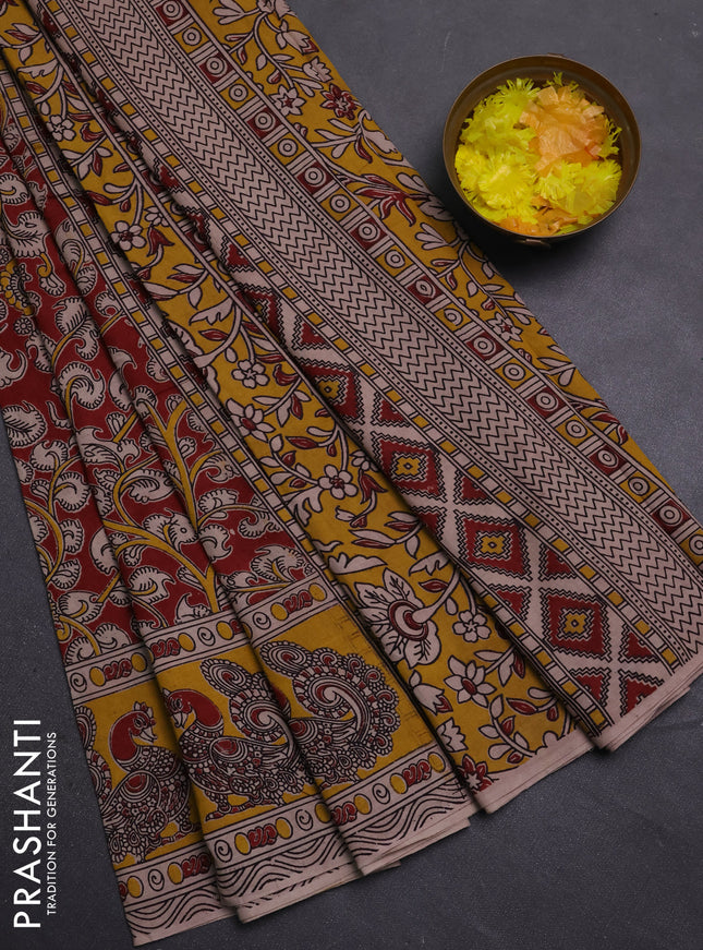 Kalamkari cotton saree maroon and yellow with allover prints and printed border