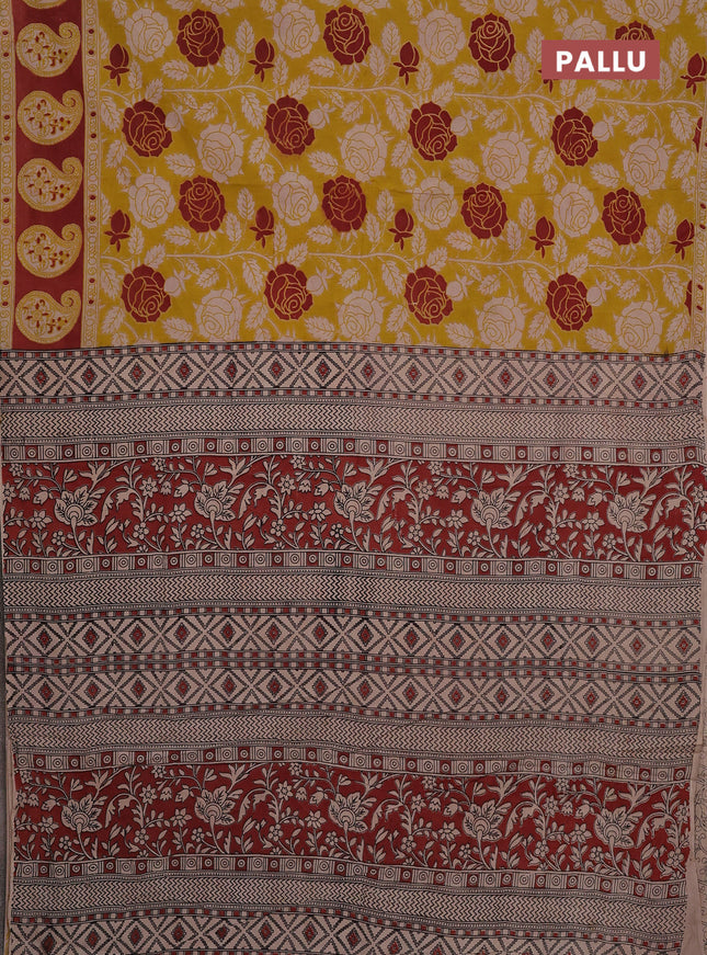 Kalamkari cotton saree yellow and rust shade with allover prints and printed border