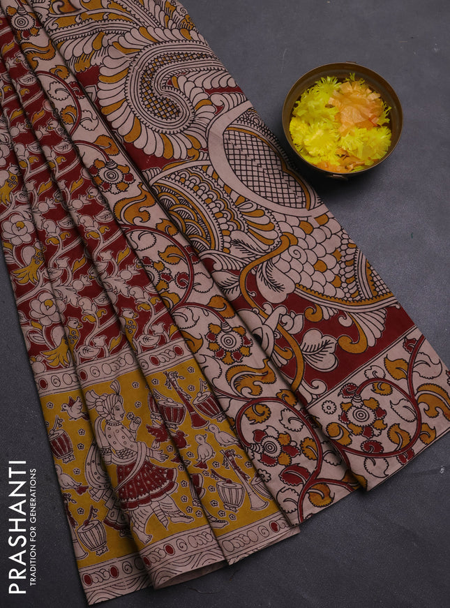 Kalamkari cotton saree maroon and yellow with allover prints and printed border