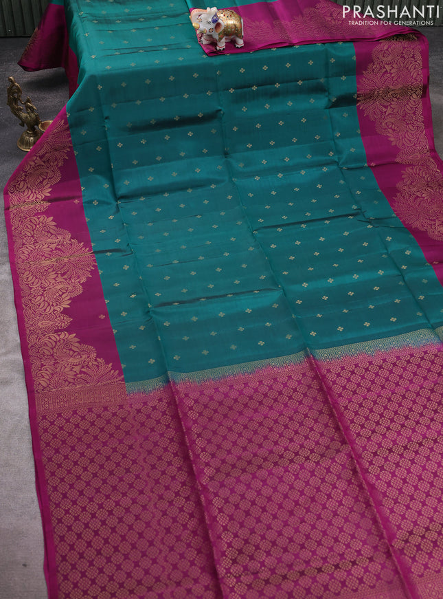 Kanchipuram soft silk saree green and megenta pink with allover zari woven buttas and long zari woven border