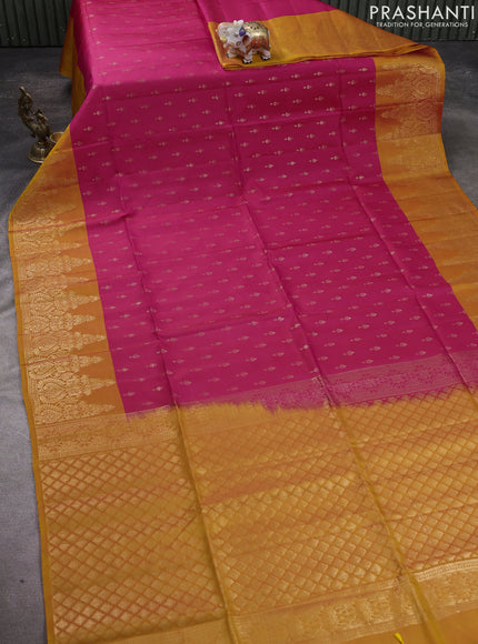 Kanchipuram soft silk saree reddish pink and yellow with allover zari woven buttas and long zari woven border