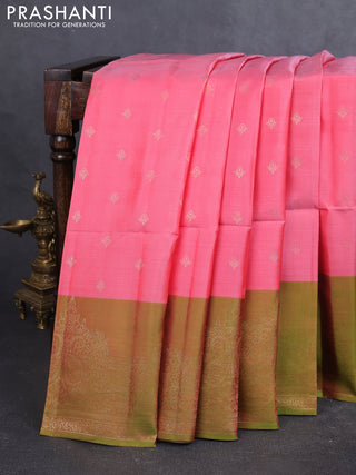 Kanchipuram soft silk saree peach pink and light green with allover zari woven buttas and zari woven border