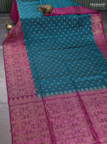 Kanchipuram soft silk saree peacock green and magenta pink with allover zari woven buttas and long zari woven border