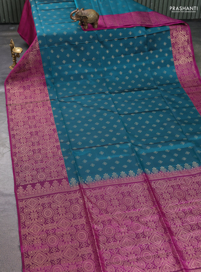 Kanchipuram soft silk saree peacock green and magenta pink with allover zari woven buttas and long zari woven border