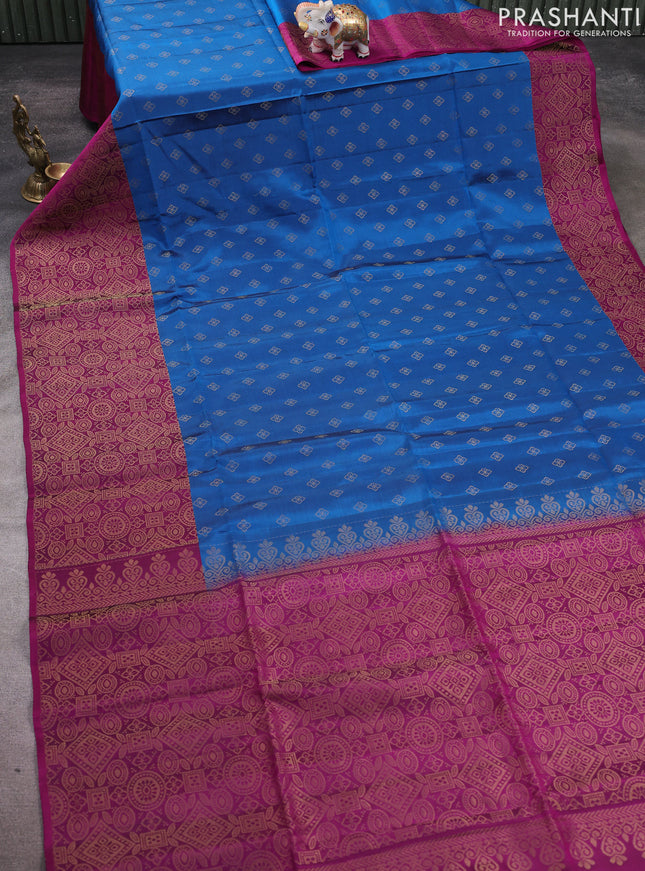 Kanchipuram soft silk saree peacock blue and magenta pink with allover zari woven buttas and long zari woven border