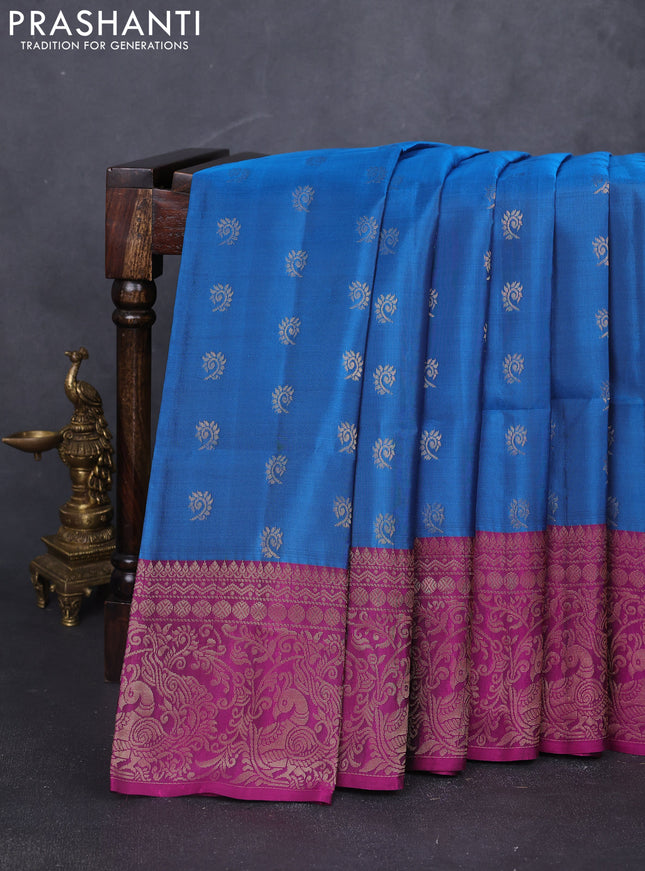 Kanchipuram soft silk saree peacock blue and magenta pink with allover zari woven buttas and long zari woven border