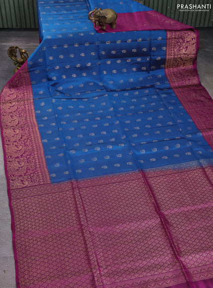 Kanchipuram soft silk saree peacock blue and magenta pink with allover zari woven buttas and long zari woven border