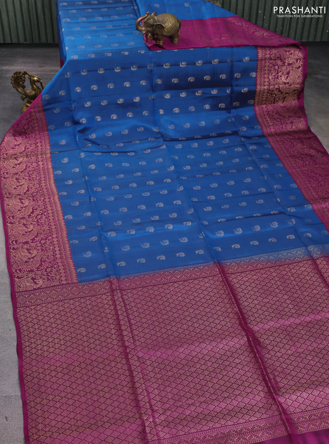 Kanchipuram soft silk saree peacock blue and magenta pink with allover zari woven buttas and long zari woven border