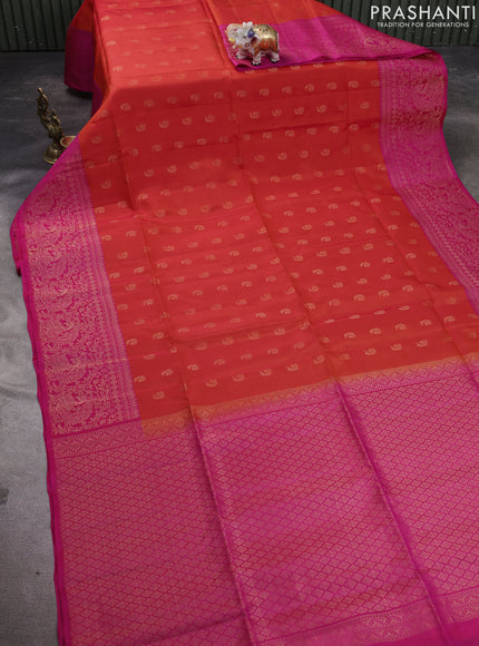 Kanchipuram soft silk saree orange and pink with allover zari woven buttas and long zari woven border