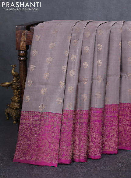 Kanchipuram soft silk saree pastel brown and magenta pink with allover zari woven buttas and long zari woven border