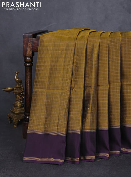 Kanchipuram soft silk saree mehendi green and purple with allover zari checked pattern and rettapet zari woven border