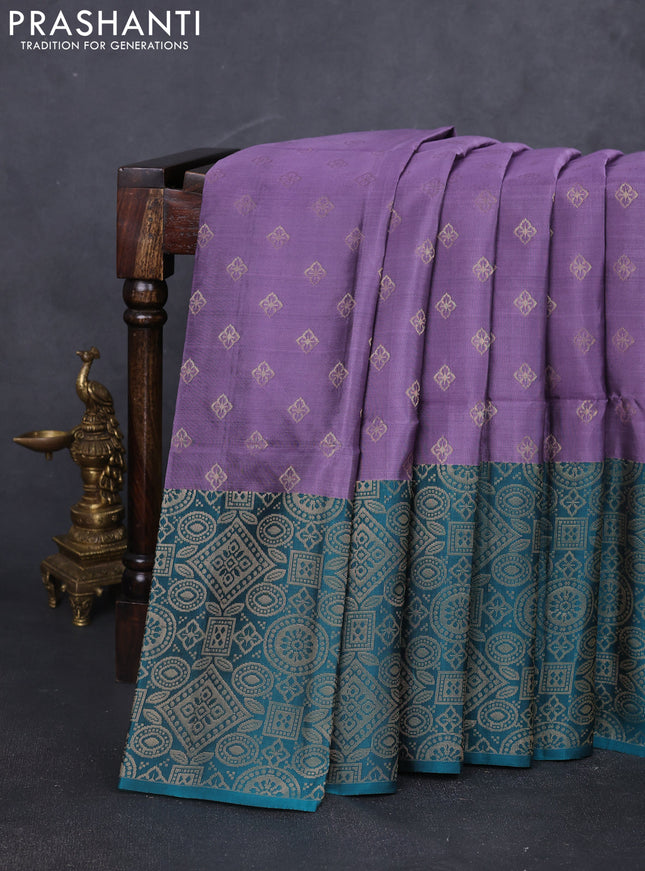 Kanchipuram soft silk saree pastel purple and peacock green with allover zari woven buttas and long zari woven border