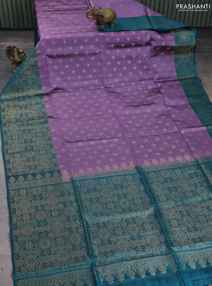 Kanchipuram soft silk saree pastel purple and peacock green with allover zari woven buttas and long zari woven border
