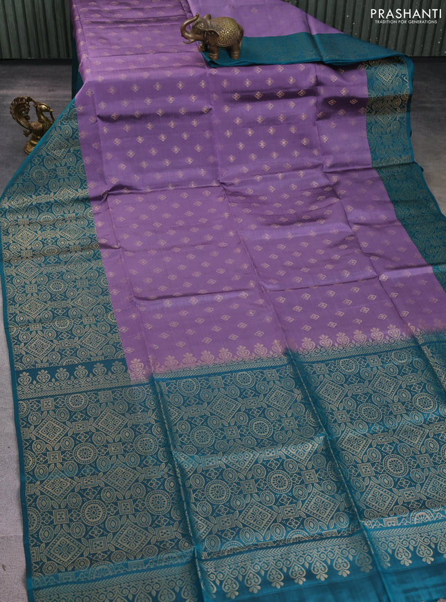 Kanchipuram soft silk saree pastel purple and peacock green with allover zari woven buttas and long zari woven border